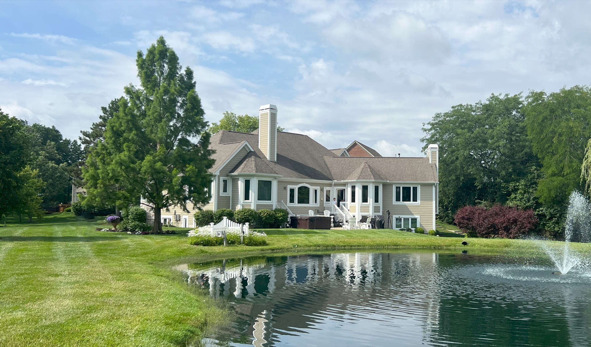 A Cincinnati home with a completed roof, siding and windows by AllGood Home Improvements